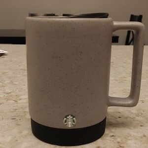 14 oz Starbucks mug with removable lid.